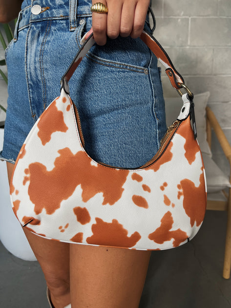 Cow print shoulder online bag