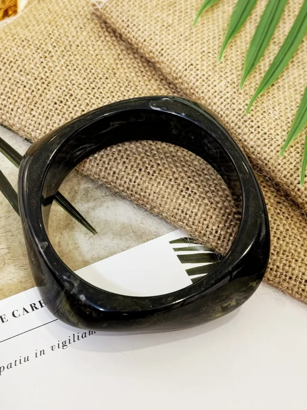 27 Asymmetrical Bangle