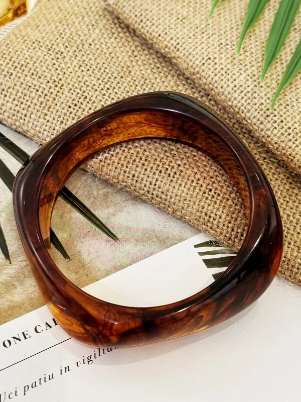 27 Asymmetrical Bangle